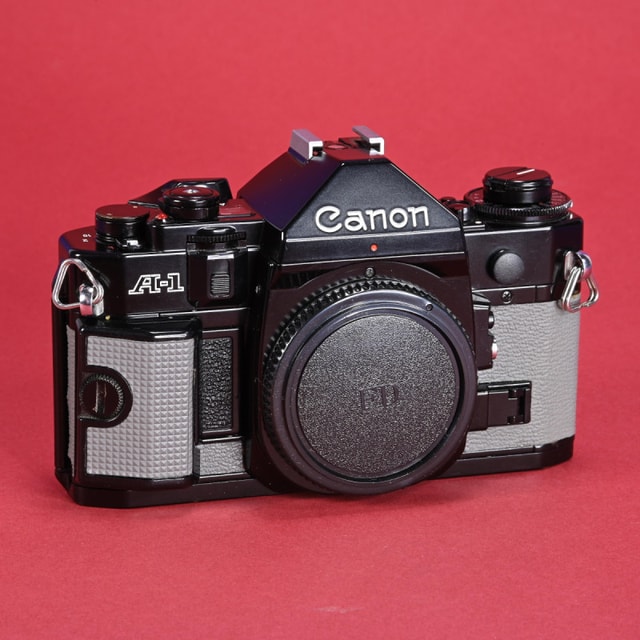 Canon A-1 Camera - Refurbished (Black with Grey Painted Leather)