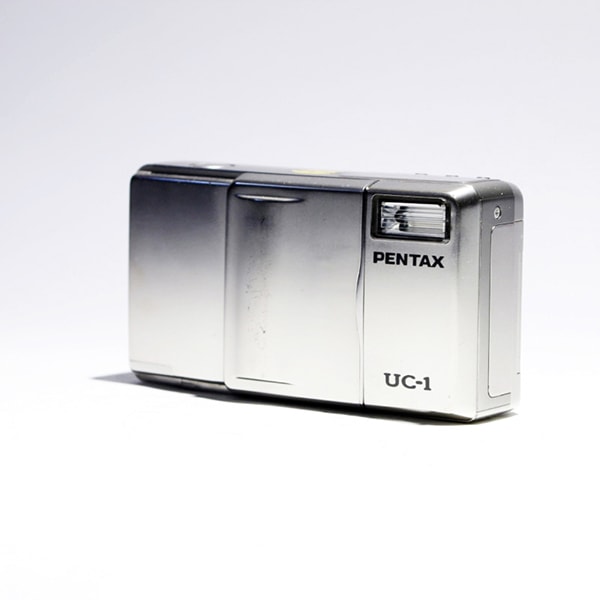 Pentax UC-1 / Espio Mini : International Camera Museum : Blue Moon