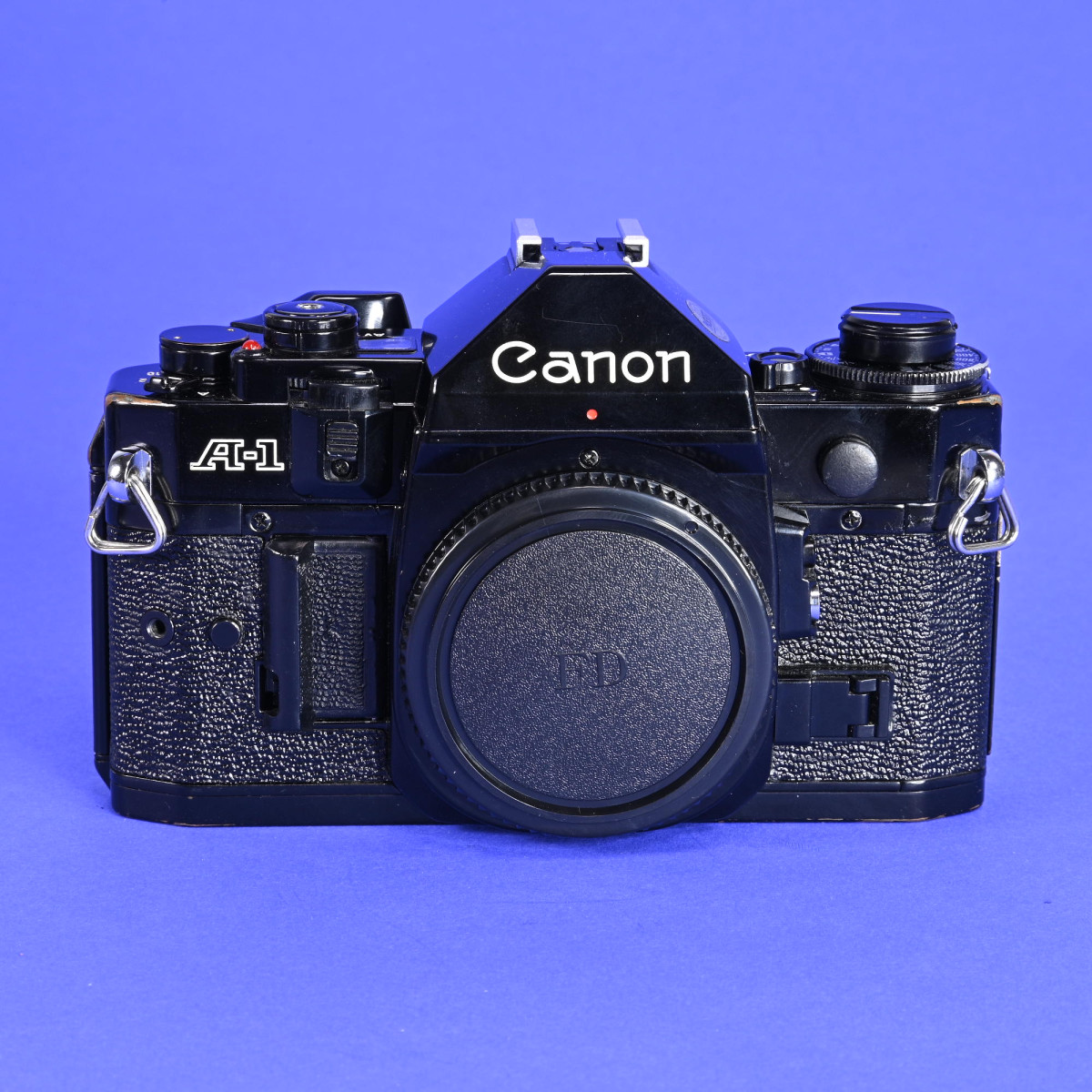 Canon A-1 35mm SLR Camera (Black) - Refurbished | Blue Moon Camera